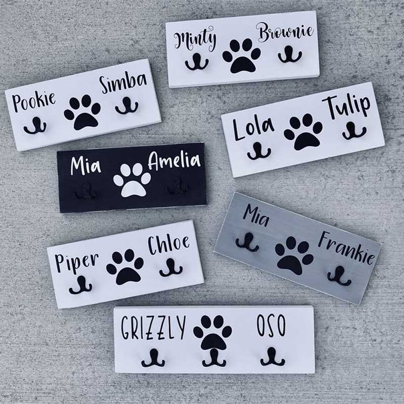 Personalized dog paw print leash holder with name and paw print for pet lovers